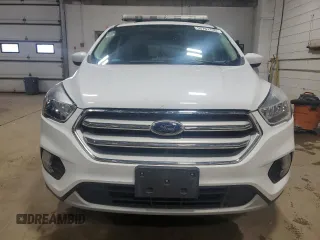 2019 Ford Escape SE z VIN 1FMCU9GD9KUA05798, wystawiony jako Copart lot #55701735 z przebiegiem 140 797 mil mil oraz Tytuł czysty. Historia ofert i sprzedaży dostępna na DreamBid. Obrazek 5.