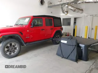 2018 Jeep Wrangler Unlimited Sahara z VIN 1C4HJXEG4JW316496, wystawiony jako IAAI lot #42437607 z przebiegiem 46 861 mil mil oraz . Historia ofert i sprzedaży dostępna na DreamBid. Obrazek 17.