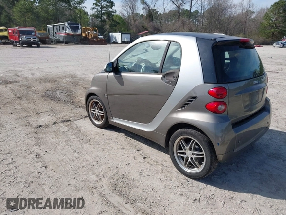 2012 Smart fortwo Pure z VIN WMEEJ3BA9CK557221, wystawiony jako IAAI lot #41828029 z przebiegiem 54 516 mil mil oraz . Historia ofert i sprzedaży dostępna na DreamBid. Obrazek 3.