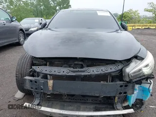 2014 Infiniti Q50 Premium z VIN JN1BV7AR2EM705630, wystawiony jako IAAI lot #42258650 z przebiegiem 109 151 mil mil oraz . Historia ofert i sprzedaży dostępna na DreamBid. Obrazek 6.