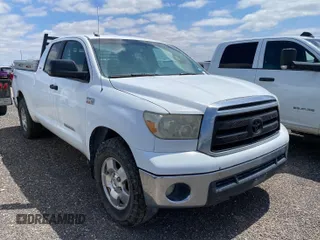 2011 Toyota Tundra with VIN 5TFUY5F1XBX198815, listed as a IAAI auction lot 42571444 with 281,114 mi miles and . Bid and sale history available at DreamBid. Image 6.