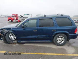 2003 Dodge Durango SLT z VIN 1D4HS48N83F579022, wystawiony jako IAAI lot #42077799 z przebiegiem 201 242 mil mil oraz . Historia ofert i sprzedaży dostępna na DreamBid. Obrazek 14.