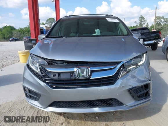 2020 Honda Odyssey EX-L with VIN 5FNRL6H72LB055672, listed as a IAAI auction lot 41586663 with 47,037 mi miles and . Bid and sale history available at carsss.com. Image 6.