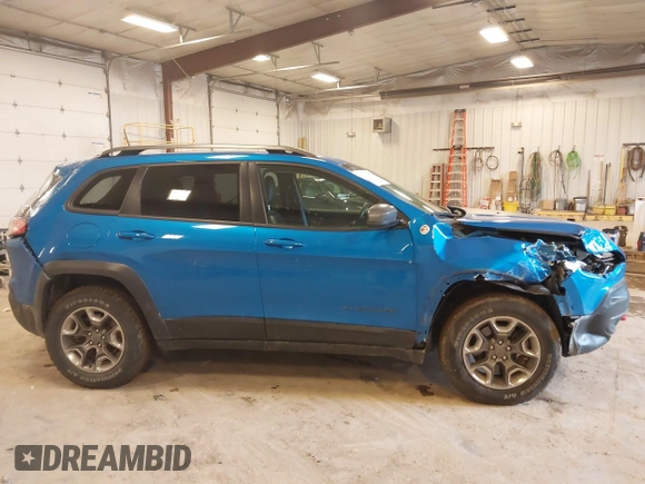 2019 Jeep Cherokee Trailhawk with VIN 1C4PJMBX4KD389637, listed as a IAAI auction lot 41740750 with 46,695 mi miles and . Bid and sale history available at DreamBid. Image 13.