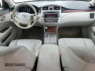2012 Toyota Avalon z VIN 4T1BK3DBXCU454457, wystawiony jako Copart lot #57153835 z przebiegiem 128 064 mil mil oraz Szkoda całkowita • Salvage title. Historia ofert i sprzedaży dostępna na DreamBid. Obrazek 8.