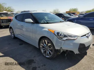 2015 Hyundai Veloster z VIN KMHTC6ADXFU222793, wystawiony jako Copart lot #57861415 z przebiegiem 98 318 mil mil oraz Szkoda całkowita • Salvage title. Historia ofert i sprzedaży dostępna na DreamBid. Obrazek 4.