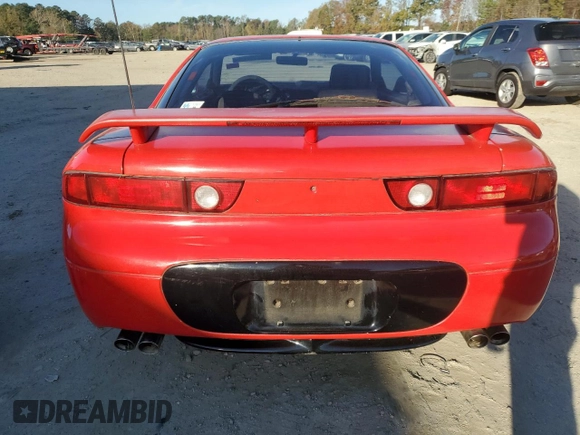1996 Mitsubishi 3000GT GT z VIN JA3AM84J7TY002343, wystawiony jako Copart lot #80521104 z przebiegiem 287 640 mil mil oraz Czysty tytuł • Clean title. Historia ofert i sprzedaży dostępna na DreamBid. Obrazek 6.