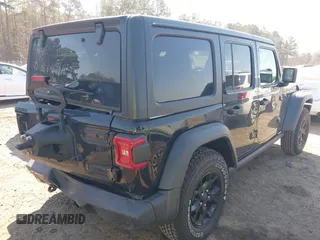 2020 Jeep Wrangler Unlimited Black and Tan with VIN 1C4HJXDGXLW219078, listed as a IAAI auction lot 41783437 with 59,137 mi miles and . Bid and sale history available at DreamBid. Image 4.