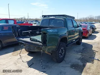 2021 Toyota Tacoma 4WD SR with VIN 3TMCZ5ANXMM382874, listed as a IAAI auction lot 41965388 with 62,178 mi miles. Bid and sale history available at carsss.com. Image 4.