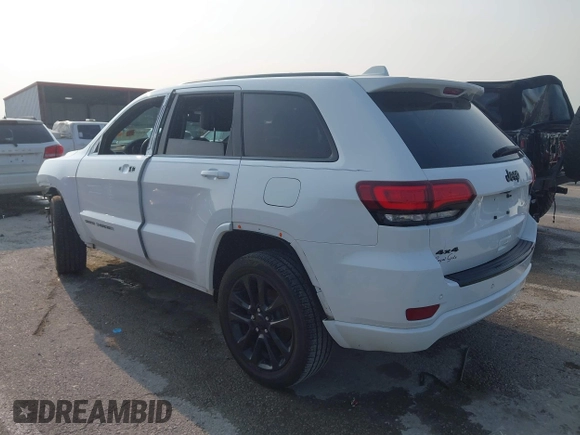 2018 Jeep Grand Cherokee Laredo with VIN 1C4RJFAGXJC121900, listed as a IAAI auction lot 42429505 with 72,351 mi miles and . Bid and sale history available at DreamBid. Image 3.