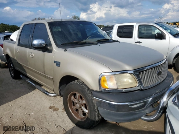 2001 Ford F-150 SuperCrew XLT with VIN 1FTRW07W11KB20234, listed as a Copart auction lot 74679364 with 0 mi miles and Non Repairable. Bid and sale history available at carsss.com. Image 4.