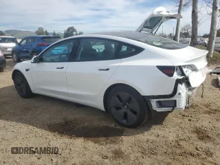 2023 Tesla Model 3 with VIN 5YJ3E1EA9PF546149, listed as a Copart auction lot 52104365 with 34,105 mi miles and Salvage Title. Bid and sale history available at DreamBid. Image 2.