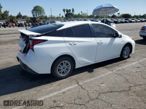2021 Toyota Prius L Eco z VIN JTDKAMFU4M3145800, wystawiony jako Copart lot #59180285 z przebiegiem 33 991 mil mil oraz Czysty tytuł • Clean title. Historia ofert i sprzedaży dostępna na DreamBid. Obrazek 3.