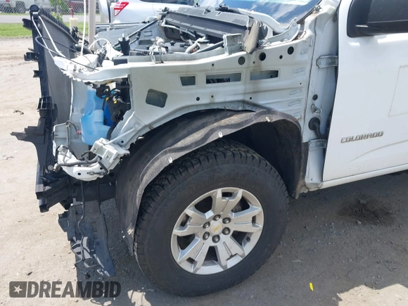 2018 Chevrolet Colorado 2WD Work Truck z VIN 1GCHSBEN4J1155188, wystawiony jako IAAI lot #42340002 z przebiegiem 83 422 mil mil oraz . Historia ofert i sprzedaży dostępna na DreamBid. Obrazek 6.