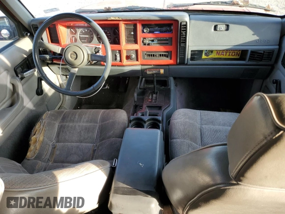 1994 Jeep Cherokee Sport with VIN 1J4FJ68S3RL239208, listed as a Copart auction lot 79121184 with 226,579 mi miles and Salvage title. Bid and sale history available at DreamBid. Image 8.