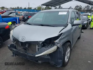 2011 Toyota Sienna LE AAS with VIN 5TDKK3DC0BS119675, listed as a IAAI auction lot 41809573 with 289,496 mi miles. Bid and sale history available at carsss.com. Image 2.