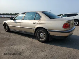 1997 BMW 7 Series 740il with VIN WBAGJ8325VDM04352, listed as a Copart auction lot 70189534 with 129,463 mi miles and Salvage Title. Bid and sale history available at carsss.com. Image 2.