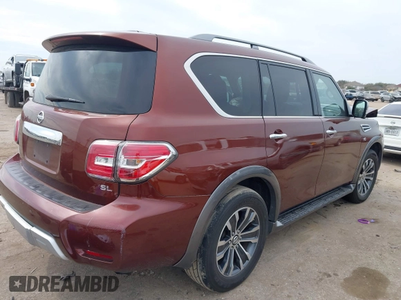 2018 Nissan Armada SL with VIN JN8AY2ND2J9051196, listed as a IAAI auction lot 41689147 with 184,547 mi miles and . Bid and sale history available at DreamBid. Image 4.