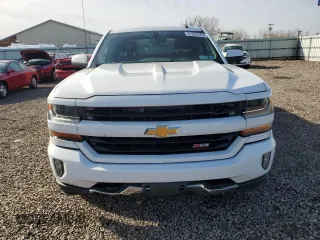 2017 Chevrolet Silverado 1500 LT with VIN 3GCUKREC7HG170799, listed as a Copart auction lot 51337575 with 115,851 mi miles and Salvage Title. Bid and sale history available at DreamBid. Image 5.