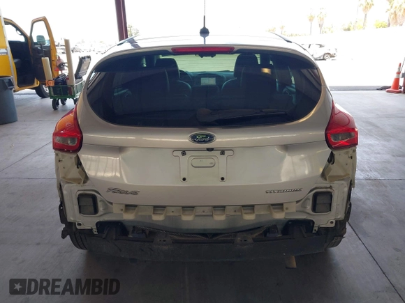 2017 Ford Focus Titanium z VIN 1FADP3N2XHL288103, wystawiony jako IAAI lot #42573844 z przebiegiem 128 952 mil mil oraz . Historia ofert i sprzedaży dostępna na DreamBid. Obrazek 17.