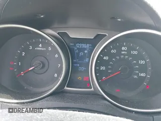 2012 Hyundai Veloster w/Gray Int with VIN KMHTC6AD3CU029042, listed as a IAAI auction lot 41416442 with 109,968 mi miles and . Bid and sale history available at DreamBid. Image 7.