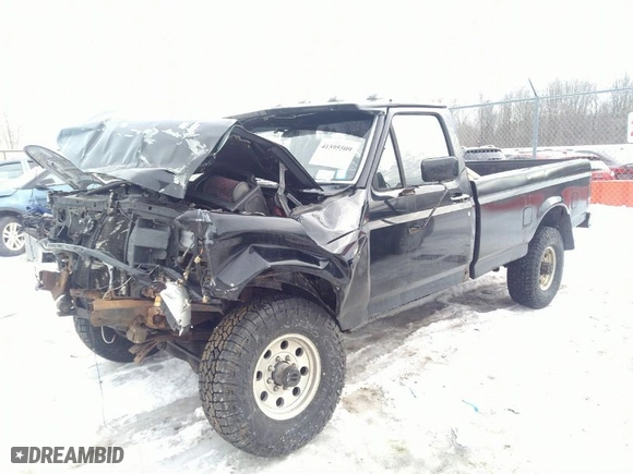 1997 Ford F-250 HD with VIN 1FTHF26F1VEA71176, listed as a IAAI auction lot 41595509 with 136,046 mi miles. Bid and sale history available at carsss.com. Image 2.
