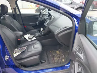 2015 Ford Focus Titanium with VIN 1FADP3J27FL298882, listed as a IAAI auction lot 42117247 with 124,185 mi miles and . Bid and sale history available at carsss.com. Image 5.