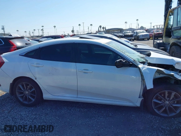 2020 Honda Civic EX-L with VIN 19XFC1F70LE203137, listed as a IAAI auction lot 42028424 with 87,011 mi miles and . Bid and sale history available at DreamBid. Image 14.