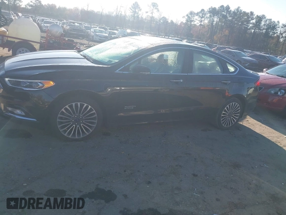2017 Ford Fusion Titanium with VIN 3FA6P0SU2HR309895, listed as a IAAI auction lot 40963527 with 80,761 mi miles and . Bid and sale history available at DreamBid. Image 14.
