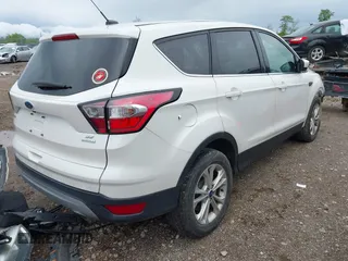 2017 Ford Escape SE with VIN 1FMCU0GD7HUC76041, listed as a IAAI auction lot 42187884 with 176,566 mi miles and . Bid and sale history available at DreamBid. Image 4.