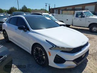 2024 Kia K5 GT-Line z VIN 5XXG64J29RG266164, wystawiony jako IAAI lot #42000245 z przebiegiem 25 306 mil mil oraz . Historia ofert i sprzedaży dostępna na DreamBid. Obrazek 1.
