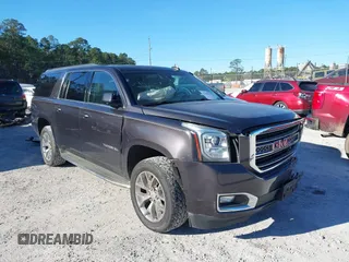 2015 GMC Yukon XL SLT with VIN 1GKS1HKC0FR675450, listed as a IAAI auction lot 41558343 with 187,814 mi miles. Bid and sale history available at carsss.com. Image 1.