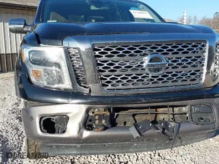 2017 Nissan Titan SV with VIN 1N6AA1E57HN516363, listed as a IAAI auction lot 41780611 with 114,749 mi miles. Bid and sale history available at carsss.com. Image 6.