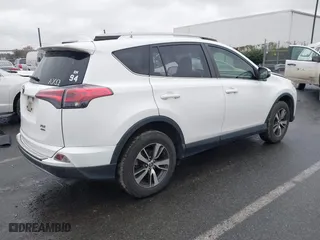2017 Toyota RAV4 XLE with VIN JTMRFREV6HJ716907, listed as a IAAI auction lot 41056444 with 118,335 mi miles. Bid and sale history available at carsss.com. Image 4.
