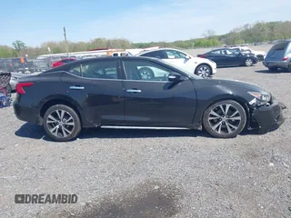 2018 Nissan Maxima SV z VIN 1N4AA6AP3JC407820, wystawiony jako IAAI lot #42098941 z przebiegiem 65 071 mil mil oraz . Historia ofert i sprzedaży dostępna na DreamBid. Obrazek 14.