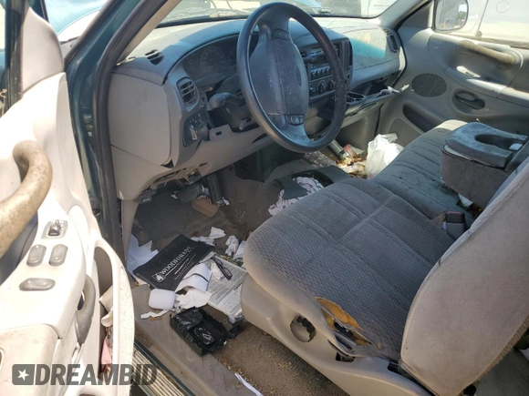 1998 Ford F-150 z VIN 1FTZX1768WNB23317, wystawiony jako Copart lot #52336895 z przebiegiem 288 431 mil mil oraz Szkoda całkowita • Salvage title. Historia ofert i sprzedaży dostępna na DreamBid. Obrazek 8.