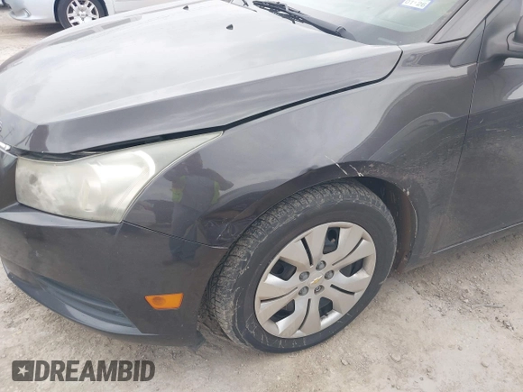 2014 Chevrolet Cruze LS z VIN 1G1PA5SH7E7208234, wystawiony jako IAAI lot #42406322 z przebiegiem 171 414 mil mil oraz . Historia ofert i sprzedaży dostępna na DreamBid. Obrazek 6.
