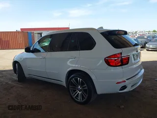2013 BMW X5 xDrive50i with VIN 5UXZV8C53D0C17368, listed as a IAAI auction lot 42505100 with 86,497 mi miles and . Bid and sale history available at DreamBid. Image 3.