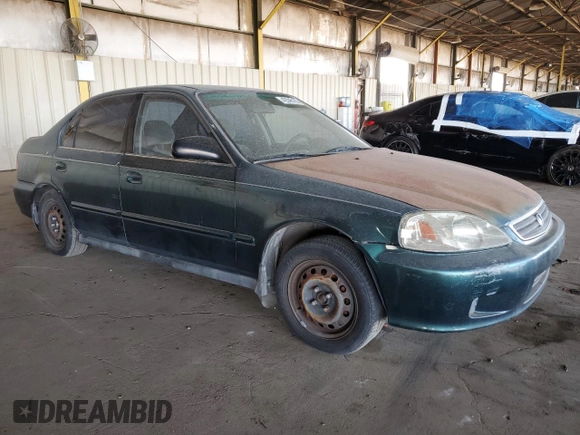2000 Honda Civic VP z VIN 2HGEJ6612YH559659, wystawiony jako Copart lot #42545185 z przebiegiem 220 343 mil mil oraz Czysty tytuł • Clean title. Historia ofert i sprzedaży dostępna na DreamBid. Obrazek 4.