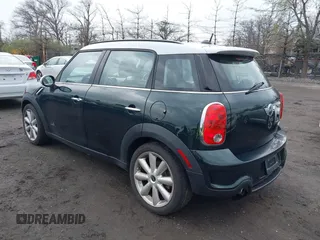 2011 MINI Countryman S with VIN WMWZC5C54BWL54135, listed as a IAAI auction lot 42034897 with 130,082 mi miles and . Bid and sale history available at DreamBid. Image 3.
