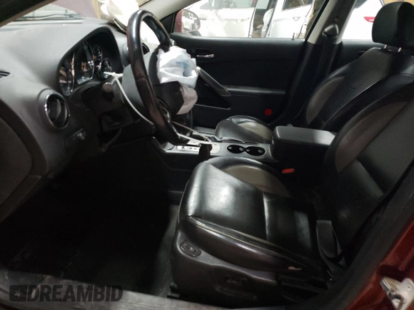 2009 Pontiac G6 GXP 1SA with VIN 1G2ZM577394178197, listed as a Copart auction lot 77670094 with 188,493 mi miles and Clean title. Bid and sale history available at DreamBid. Image 7.