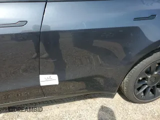 2024 Tesla Model Y Long Range z VIN 7SAYGDEE3RA234223, wystawiony jako Copart lot #51784185 z przebiegiem 24 257 mil mil oraz Szkoda całkowita • Salvage title. Historia ofert i sprzedaży dostępna na DreamBid. Obrazek 12.