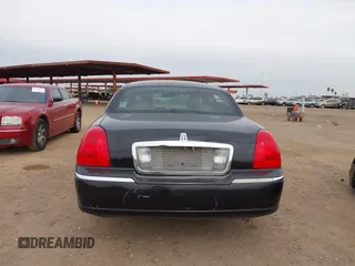 2008 Lincoln Town Car z VIN 2LNHM85WX8X636193, wystawiony jako IAAI lot #41916910 z przebiegiem Nie podano mil oraz . Historia ofert i sprzedaży dostępna na DreamBid. Obrazek 15.