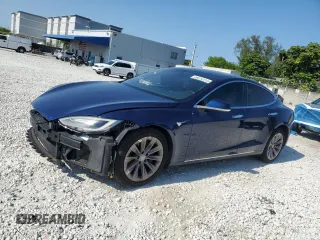 2017 Tesla Model S 100D z VIN 5YJSA1E25HF215893, wystawiony jako Copart lot #56012315 z przebiegiem Nie podano mil oraz Szkoda całkowita • Salvage title. Historia ofert i sprzedaży dostępna na DreamBid. Obrazek 1.