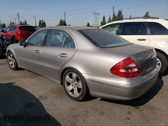 2005 Mercedes-Benz E 5.0L with VIN WDBUF70J75A693702, listed as a Copart auction lot 63497604 with 122,410 mi miles and Clean Title. Bid and sale history available at carsss.com. Image 2.