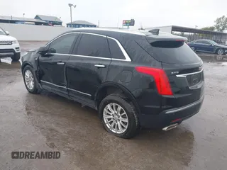 2017 Cadillac XT5 FWD with VIN 1GYKNARS0HZ317508, listed as a IAAI auction lot 40818768 with 132,598 mi miles. Bid and sale history available at carsss.com. Image 3.