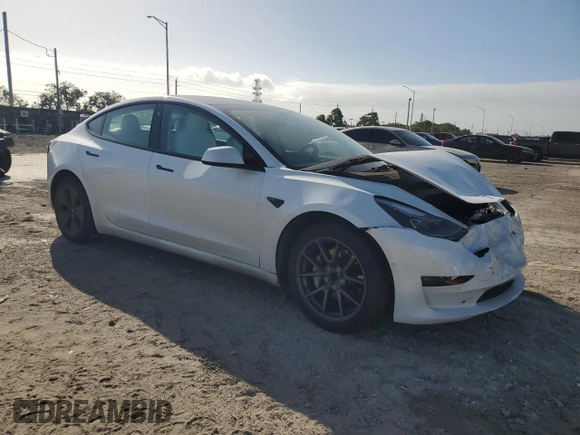 2021 Tesla Model 3 Standard Range Plus with VIN 5YJ3E1EA4MF089259, listed as a Copart auction lot 75398924 with 32,166 mi miles and Salvage Title. Bid and sale history available at DreamBid. Image 4.