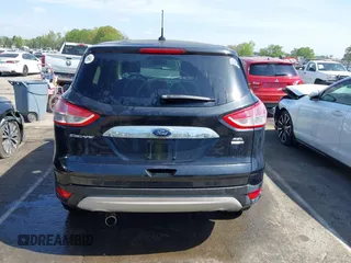 2013 Ford Escape SEL with VIN 1FMCU9H94DUA10002, listed as a IAAI auction lot 41963247 with 85,941 mi miles. Bid and sale history available at carsss.com. Image 16.