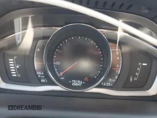 2015 Volvo XC60 T5 z VIN YV4612RK7F2716797, wystawiony jako Copart lot #58010425 z przebiegiem 49 647 mil mil oraz Szkoda całkowita • Salvage title. Historia ofert i sprzedaży dostępna na DreamBid. Obrazek 9.