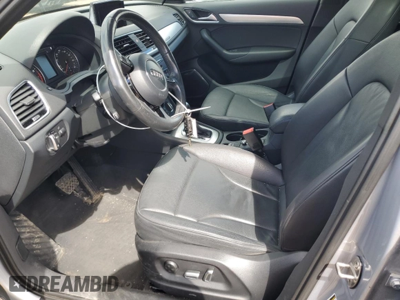2017 Audi Q3 Prestige with VIN WA1GCCFS0HR005569, listed as a Copart auction lot 57902185 with 89,900 mi miles and Salvage title. Bid and sale history available at DreamBid. Image 7.